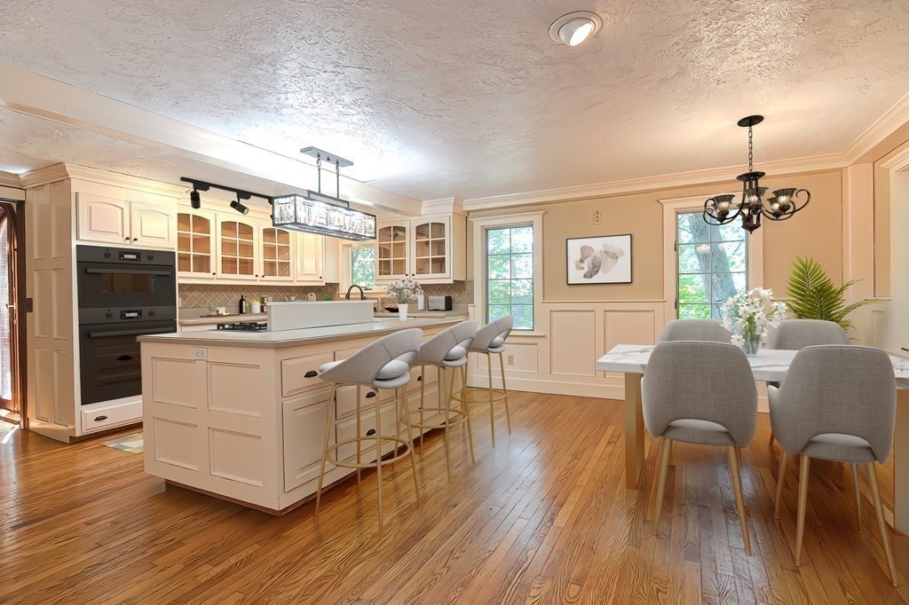 1 Summit Road Franklin, MA 02038 - Photo 39 of 42 a kitchen with stainless steel appliances granite countertop a stove and a wooden floors
