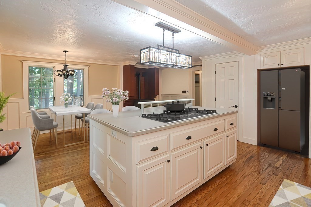 1 Summit Road Franklin, MA 02038 - Photo 40 of 42 a kitchen with stainless steel appliances a kitchen island hardwood floor and a sink