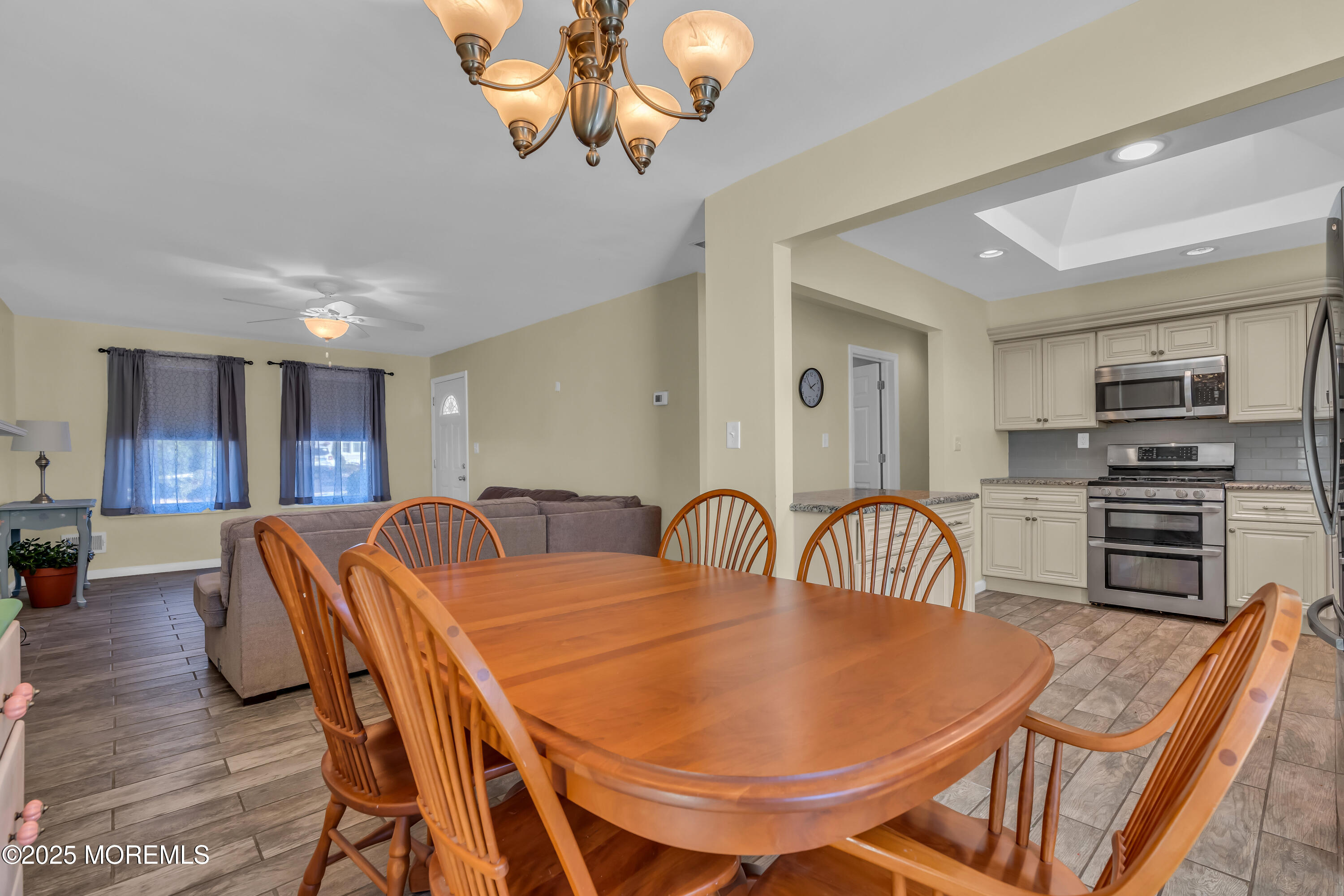 104 Garden Road Shrewsbury, NJ 07702 - Photo 11 of 24 a dining room with furniture and chandelier