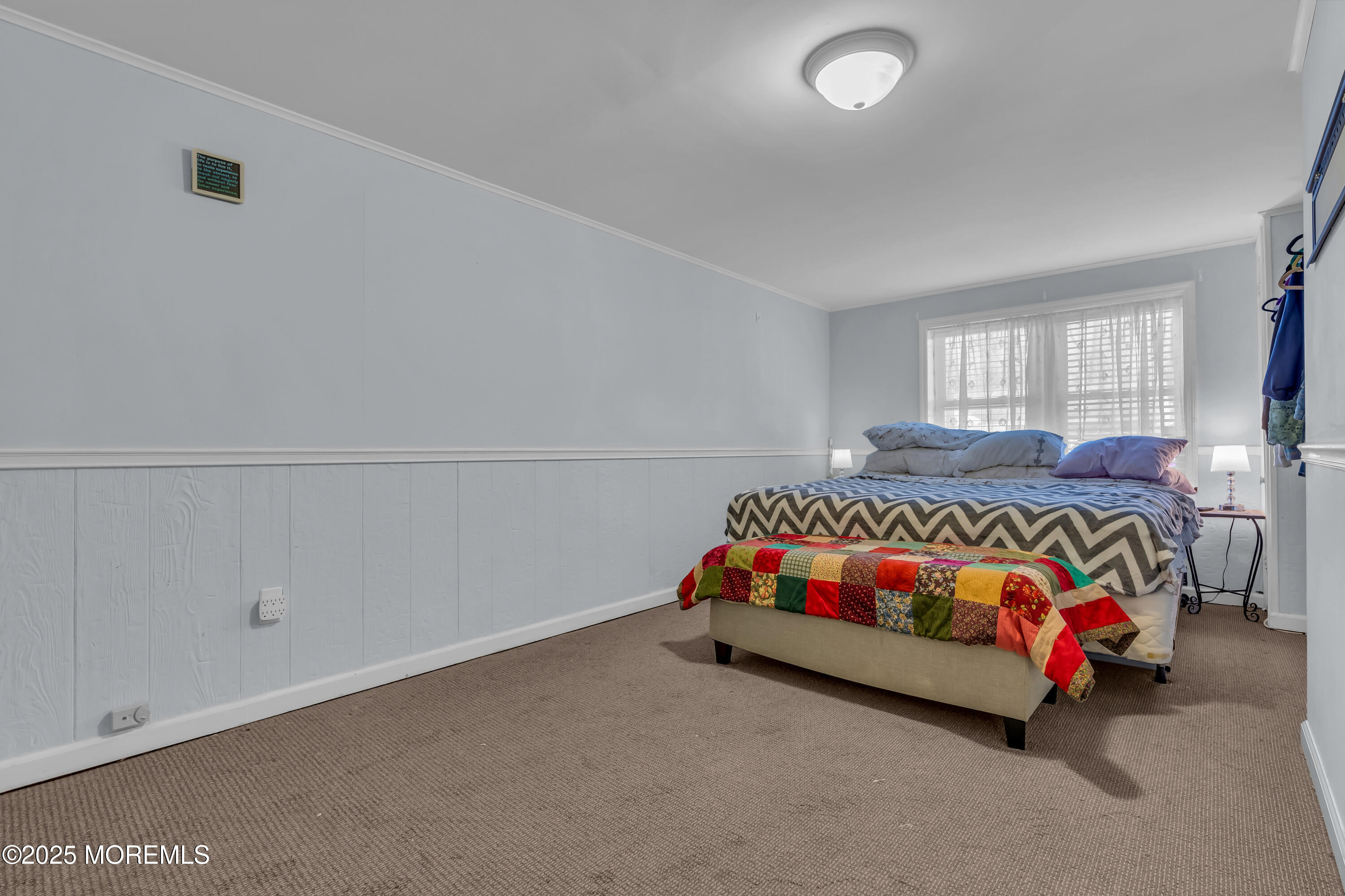 104 Garden Road Shrewsbury, NJ 07702 - Photo 17 of 24 a bedroom with a bed and window