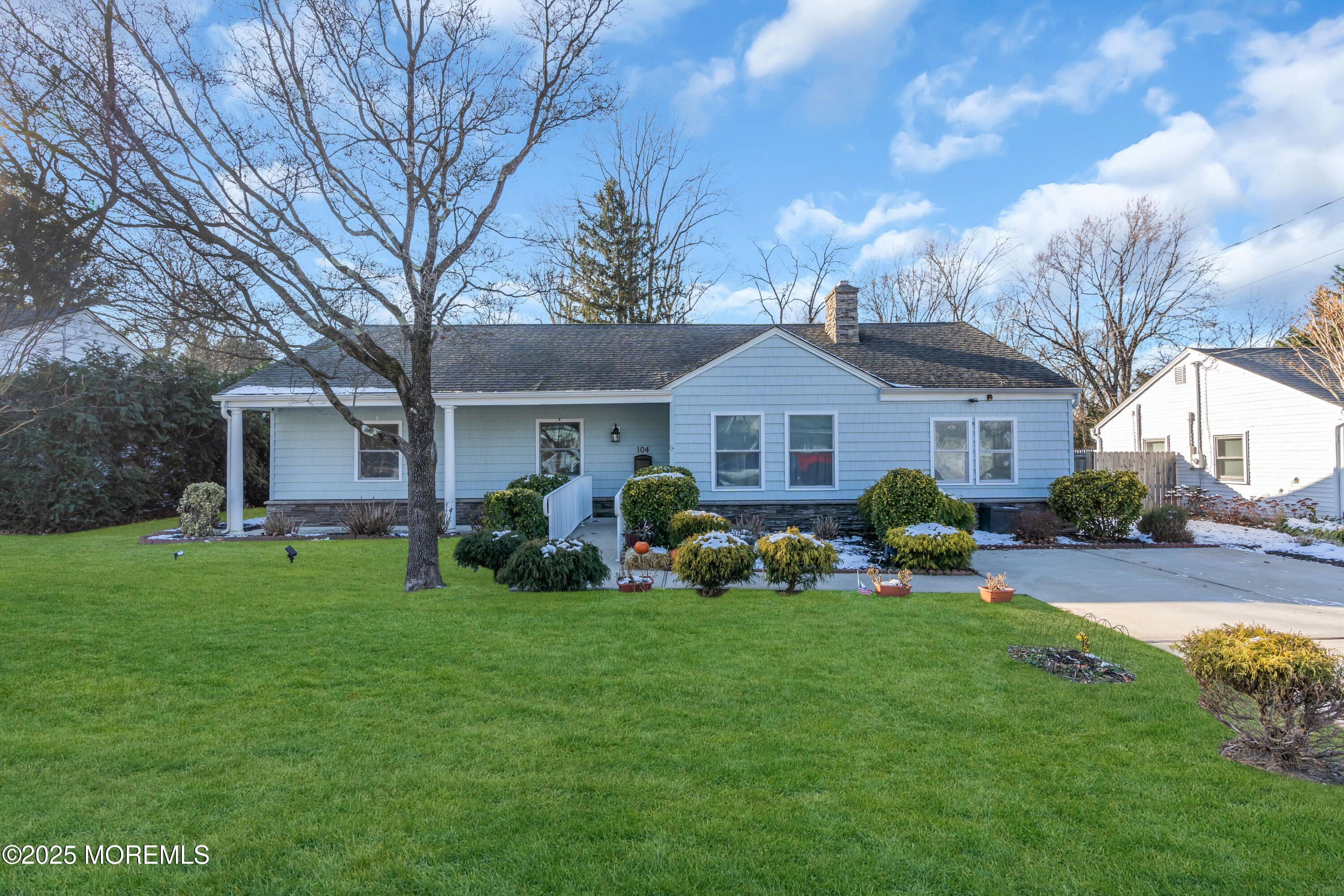 104 Garden Road Shrewsbury, NJ 07702 - Photo 2 of 24 a front view of house with yard and green space