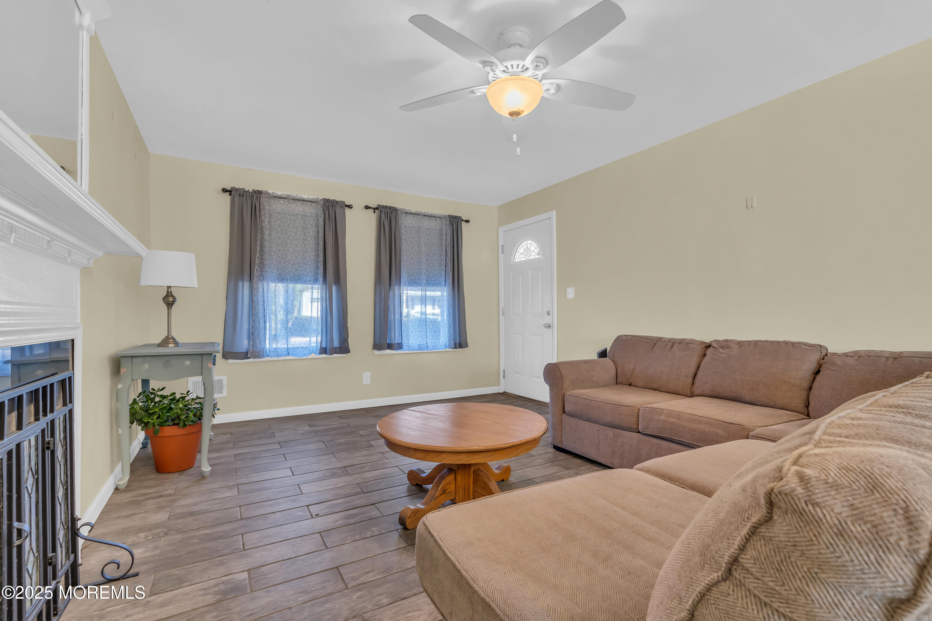 104 Garden Road Shrewsbury, NJ 07702 - Photo 7 of 24 a living room with furniture and a potted plant