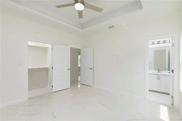 an empty room with a bathroom