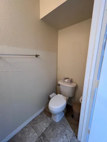 a view of a big room with staircase