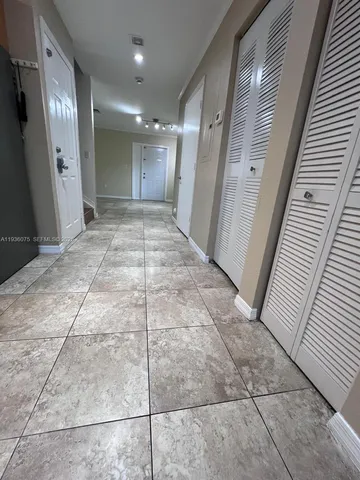 a bathroom with a sink toilet and a mirror