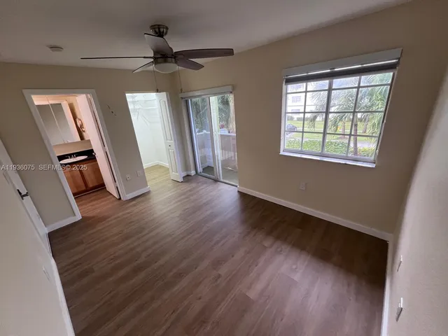 a view of a backyard with a garden