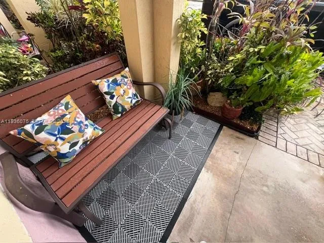 a view of a backyard with plants