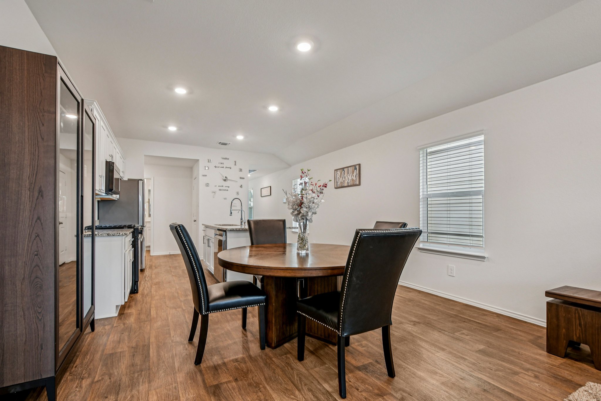 519 Sandringham Loop Kyle, TX 78640 - Photo 11 of 32 Dining space featuring recessed lighting and dark wood-type flooring