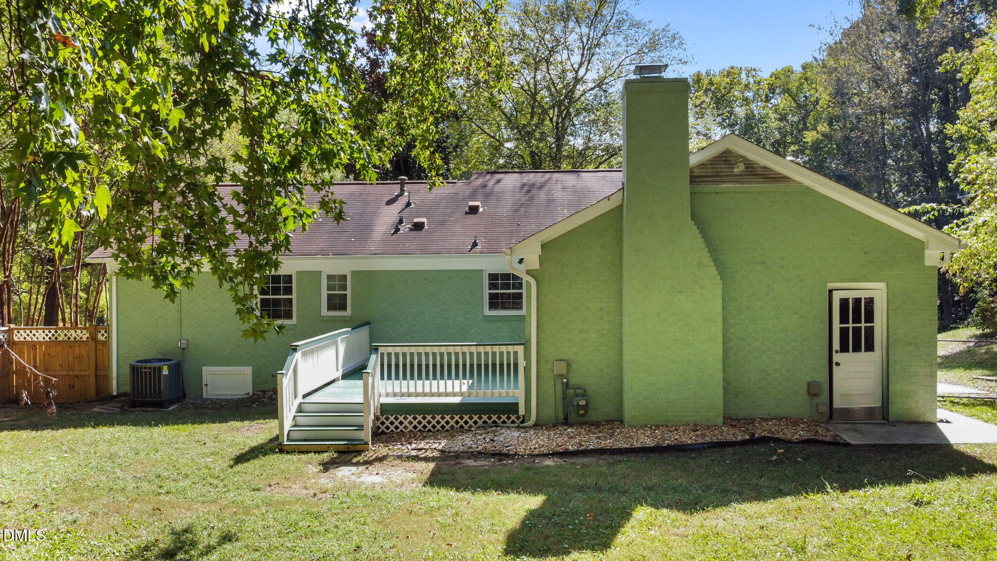 704 Brighton Road Durham, NC 27707 - Photo 19 of 23 a view of a house with a yard
