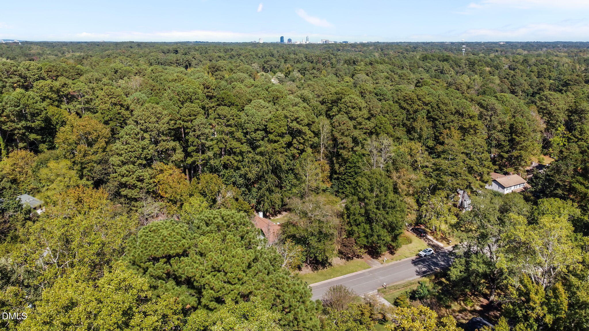 704 Brighton Road Durham, NC 27707 - Photo 23 of 25 a view of a field of grass and trees