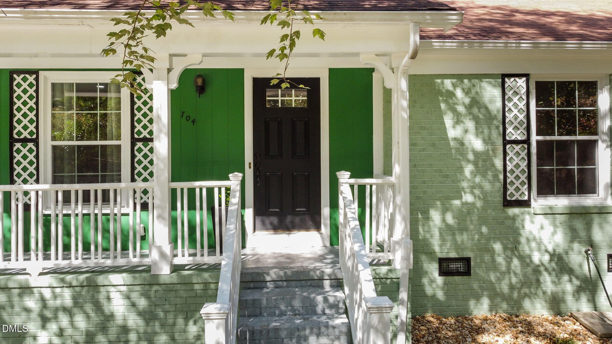 704 Brighton Road Durham, NC 27707 - Photo 24 of 25 front view of a house with a glass door