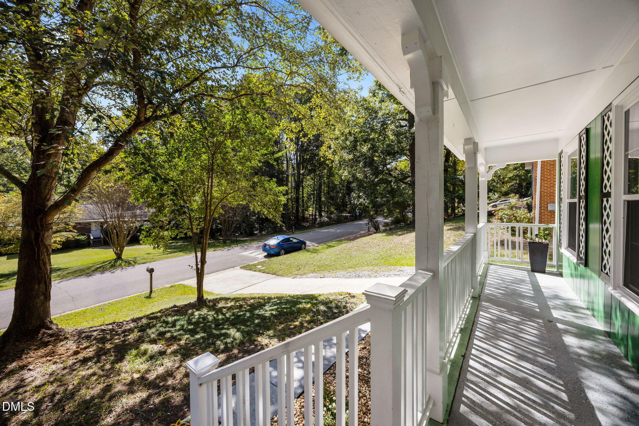 704 Brighton Road Durham, NC 27707 - Photo 3 of 25 a view of a porch with a yard