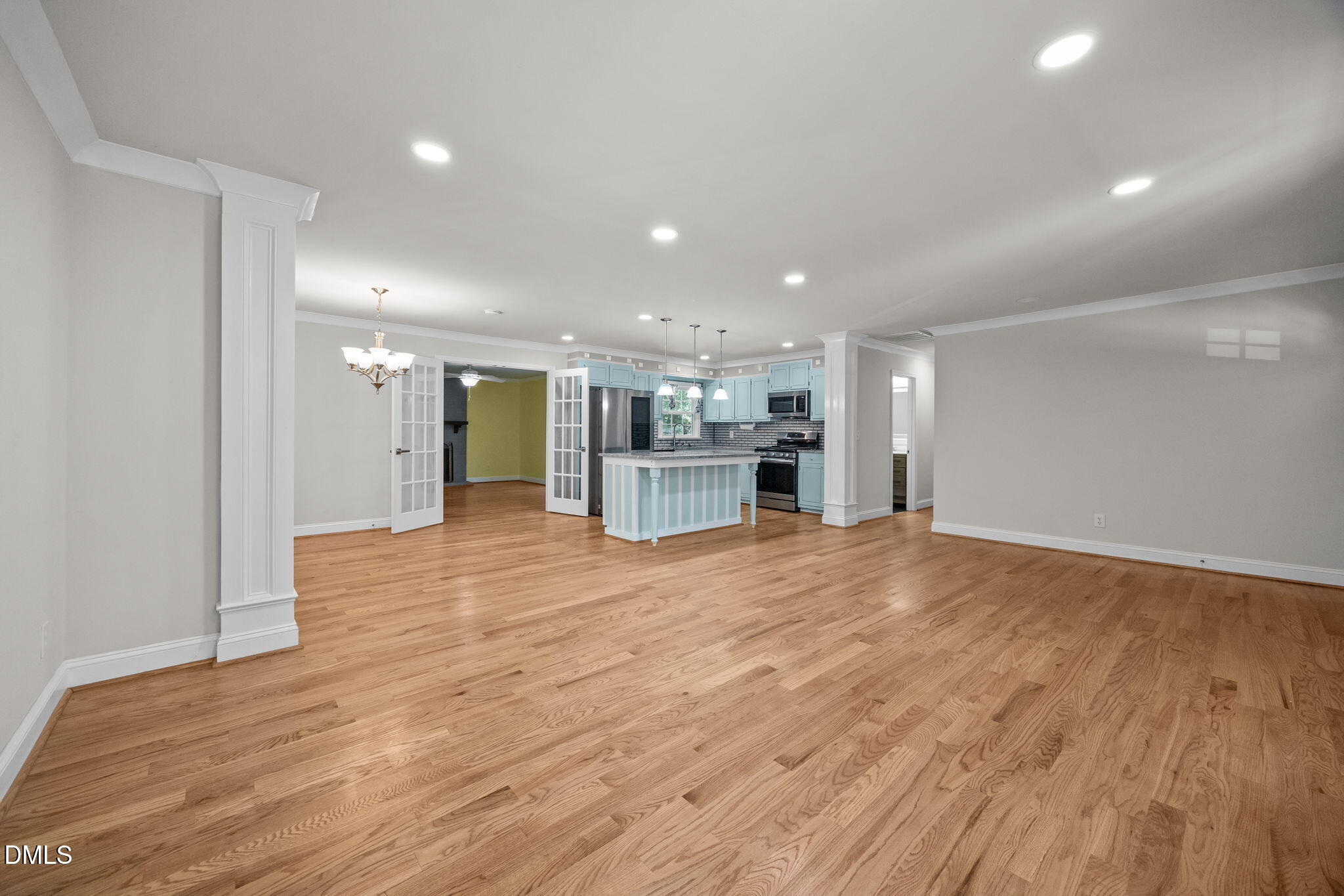 704 Brighton Road Durham, NC 27707 - Photo 4 of 25 a view of empty room with wooden floor