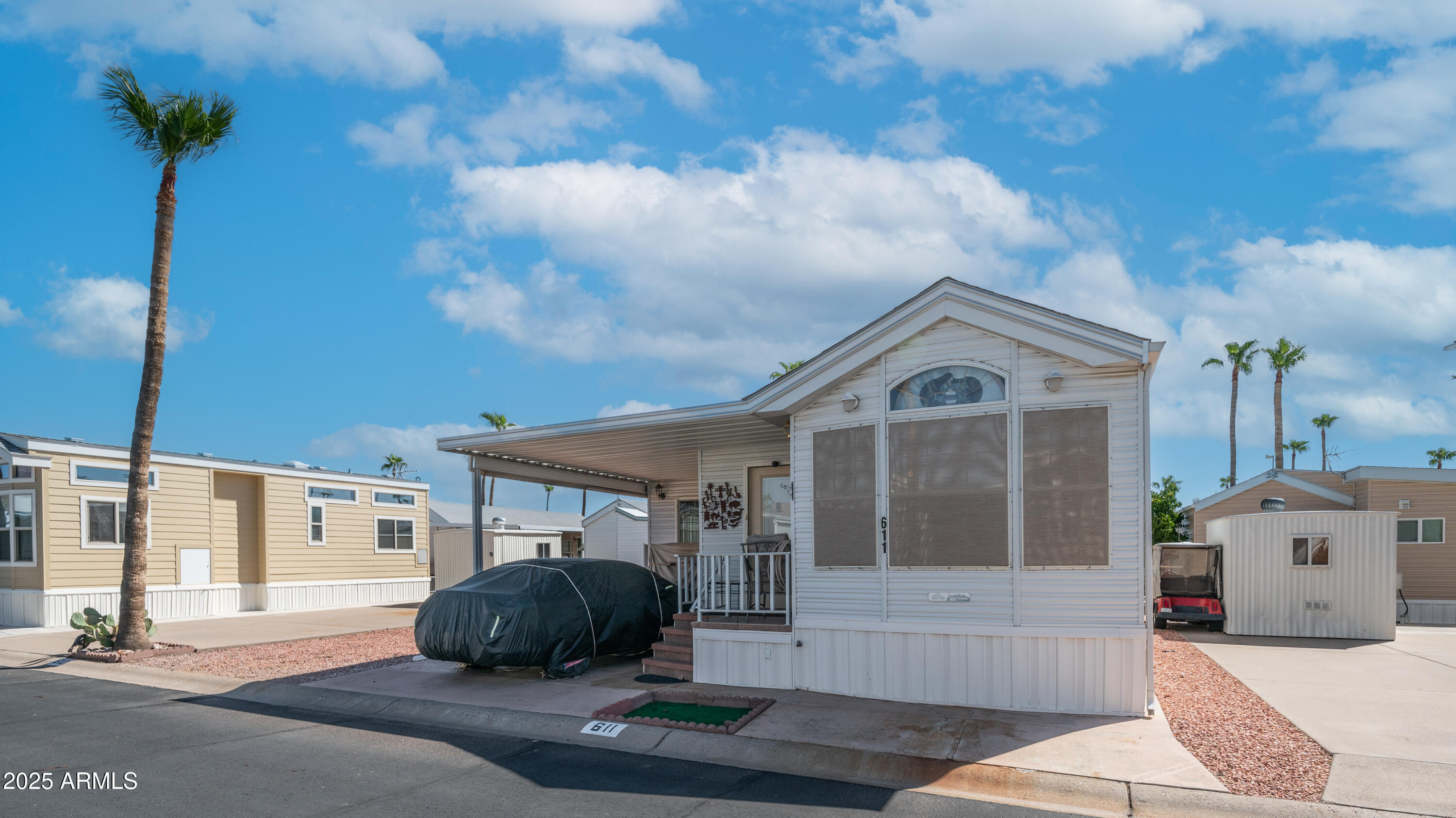 611 South Ironstone Drive, Unit 611 Apache Junction, AZ 85119 - Photo 2 of 57 3710 S Goldfield Rd Lot 611 Exterior Pho