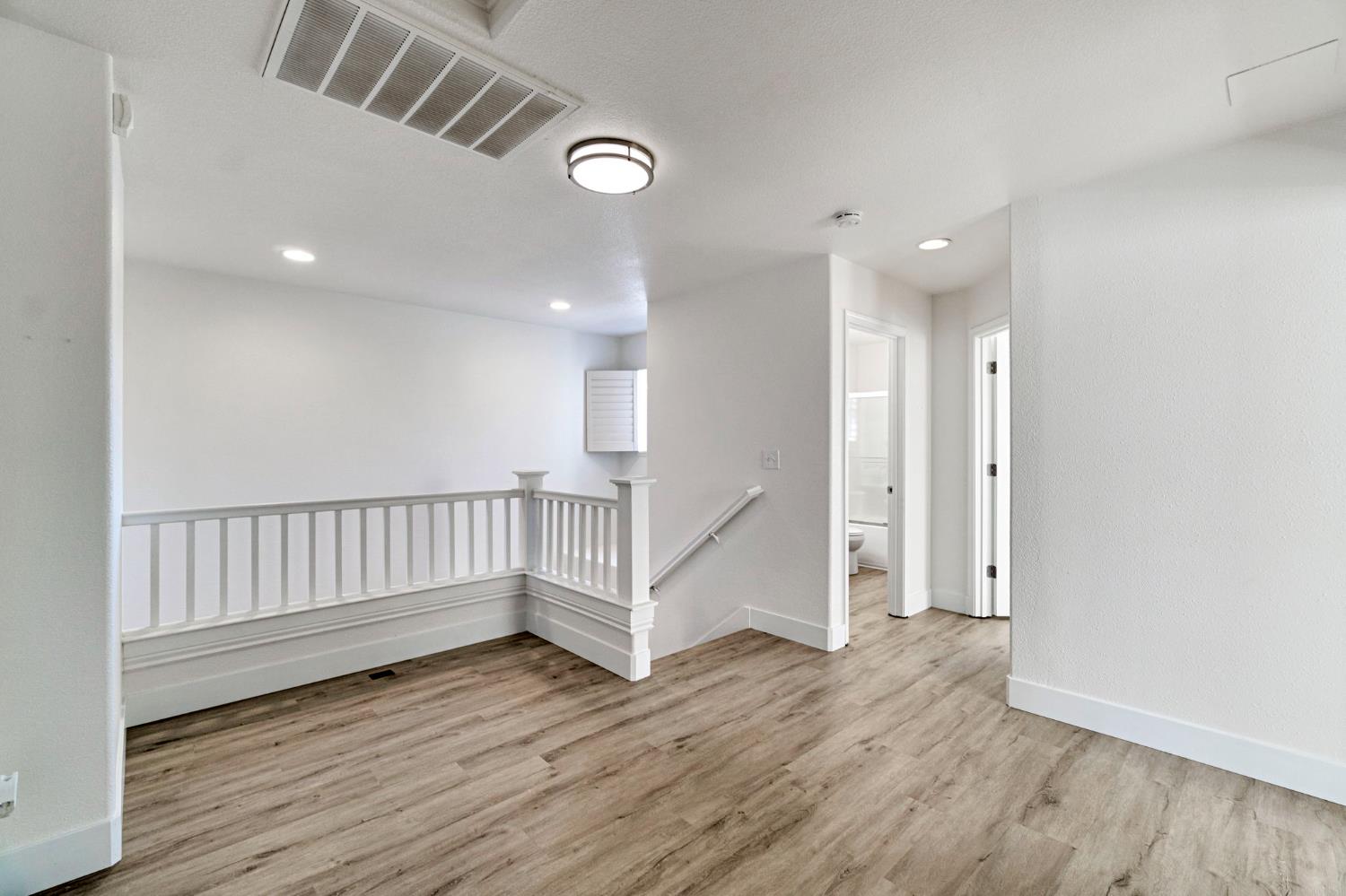 692 Blueberry Lane Madera, CA 93638 - Photo 20 of 44 a view of entryway with wooden floor