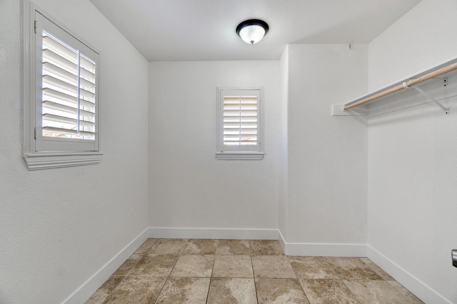 692 Blueberry Lane Madera, CA 93638 - Photo 34 of 44 an empty room with a window