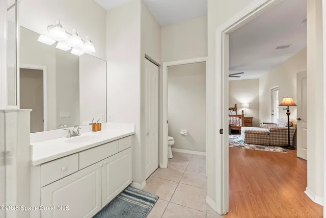 an aerial view of a house with outdoor space and pool