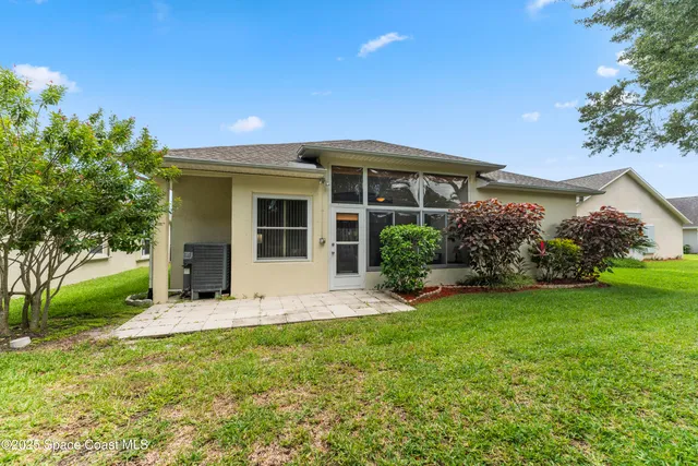 an aerial view of a city with lots of residential buildings