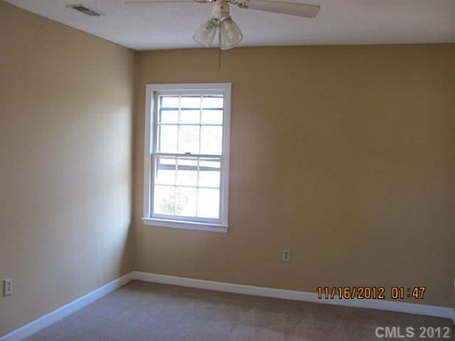4400 Truscott Road Charlotte, NC 28226 - Photo 14 of 15 an empty room with a window
