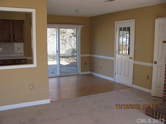 4400 Truscott Road Charlotte, NC 28226 - Photo 4 of 15 an empty room with windows