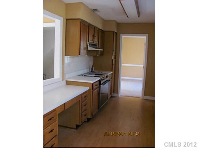 4400 Truscott Road Charlotte, NC 28226 - Photo 6 of 15 a kitchen with stainless steel appliances granite countertop a refrigerator and a stove