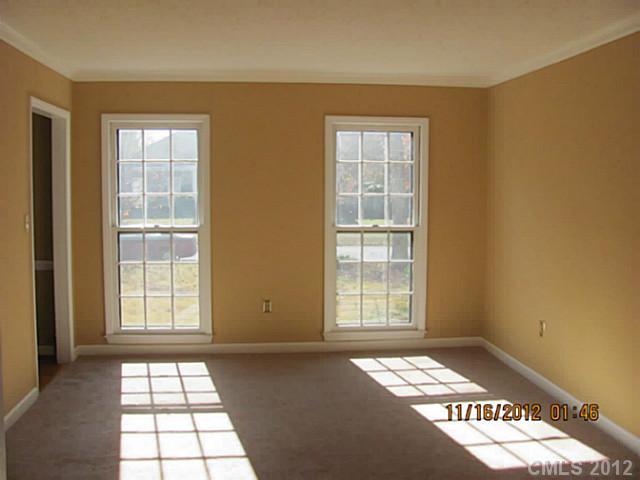 4400 Truscott Road Charlotte, NC 28226 - Photo 9 of 15 an empty room with windows