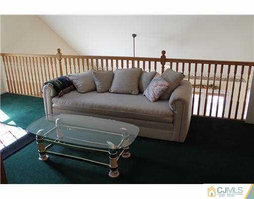 56 Pennington Road New Brunswick, NJ 08901 - Photo 11 of 20 a balcony with a couch