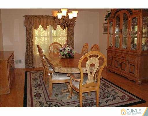 56 Pennington Road New Brunswick, NJ 08901 - Photo 5 of 20 a view of a dining room with furniture
