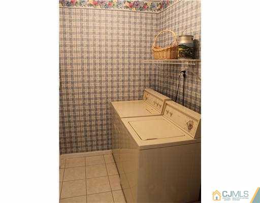 56 Pennington Road New Brunswick, NJ 08901 - Photo 9 of 20 a bathroom with a sink and a shower