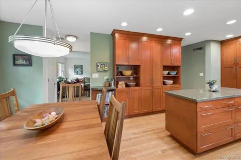 a view of a kitchen and dining room