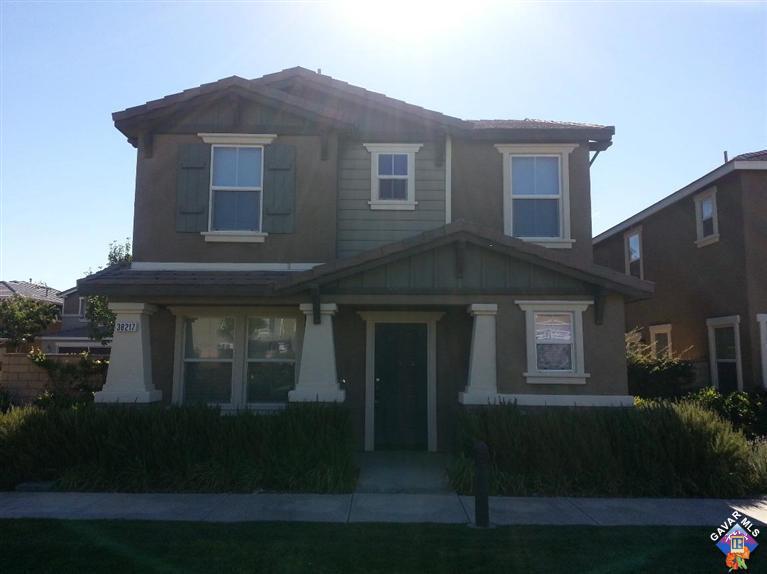 38217 Rioja Court Palmdale, CA 93550 - Photo 1 of 14 a front view of a house with a yard