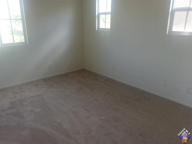 38217 Rioja Court Palmdale, CA 93550 - Photo 13 of 14 an empty room with a window