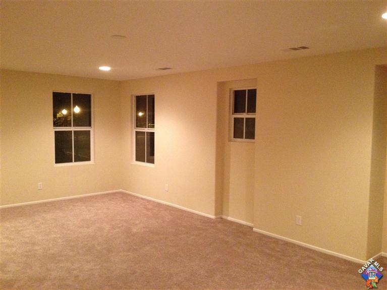 38217 Rioja Court Palmdale, CA 93550 - Photo 8 of 14 a view of an empty room with a window