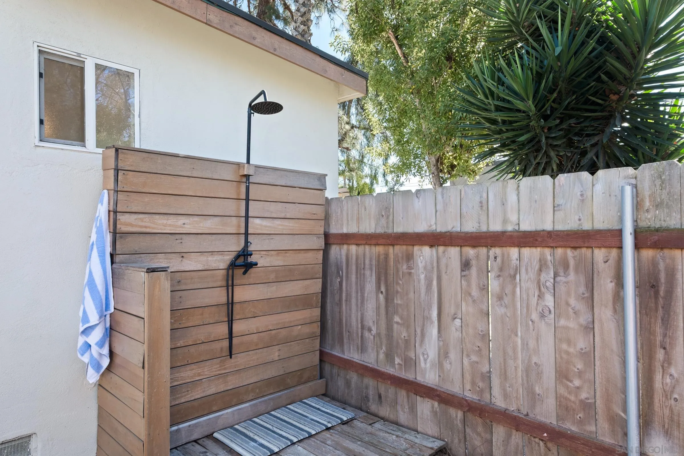 701 Valley Avenue Solana Beach, CA 92075 - Photo 19 of 38 a view of wooden fence and trees
