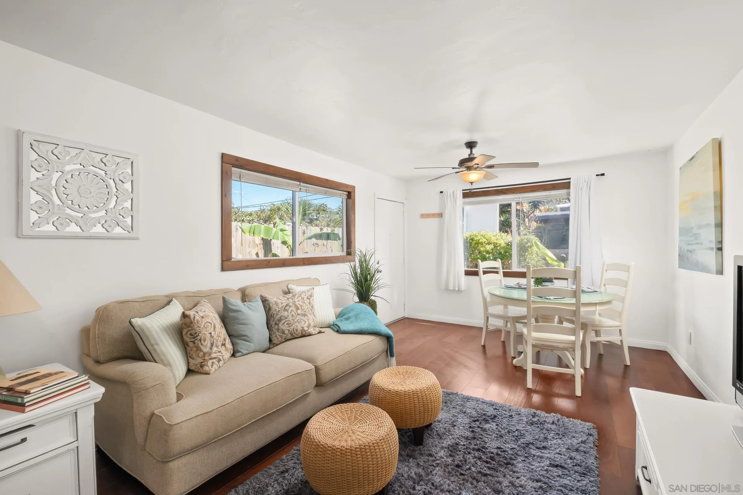 701 Valley Avenue Solana Beach, CA 92075 - Photo 20 of 38 a living room with furniture and a large window