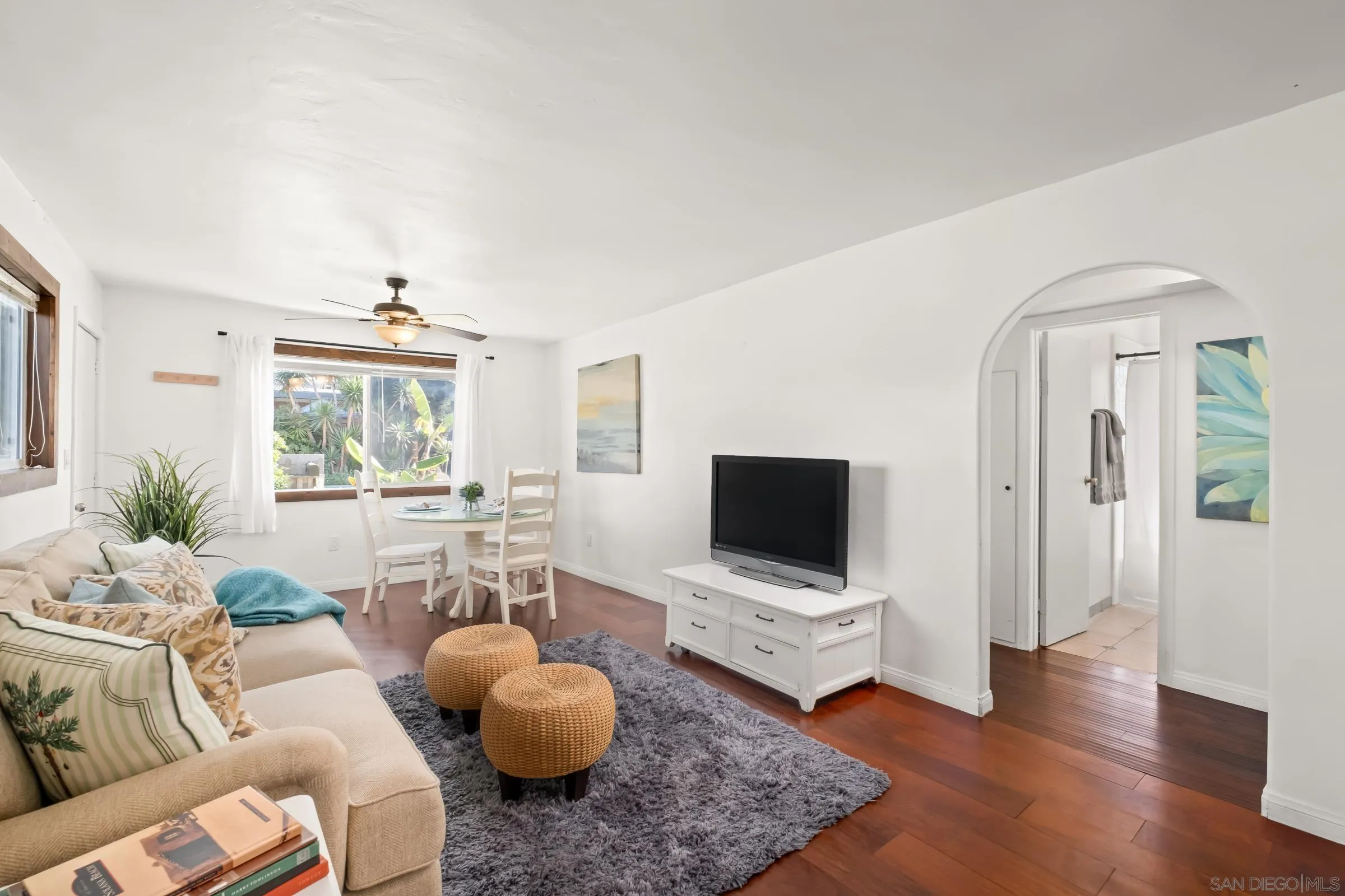 701 Valley Avenue Solana Beach, CA 92075 - Photo 21 of 38 a living room with furniture and a flat screen tv