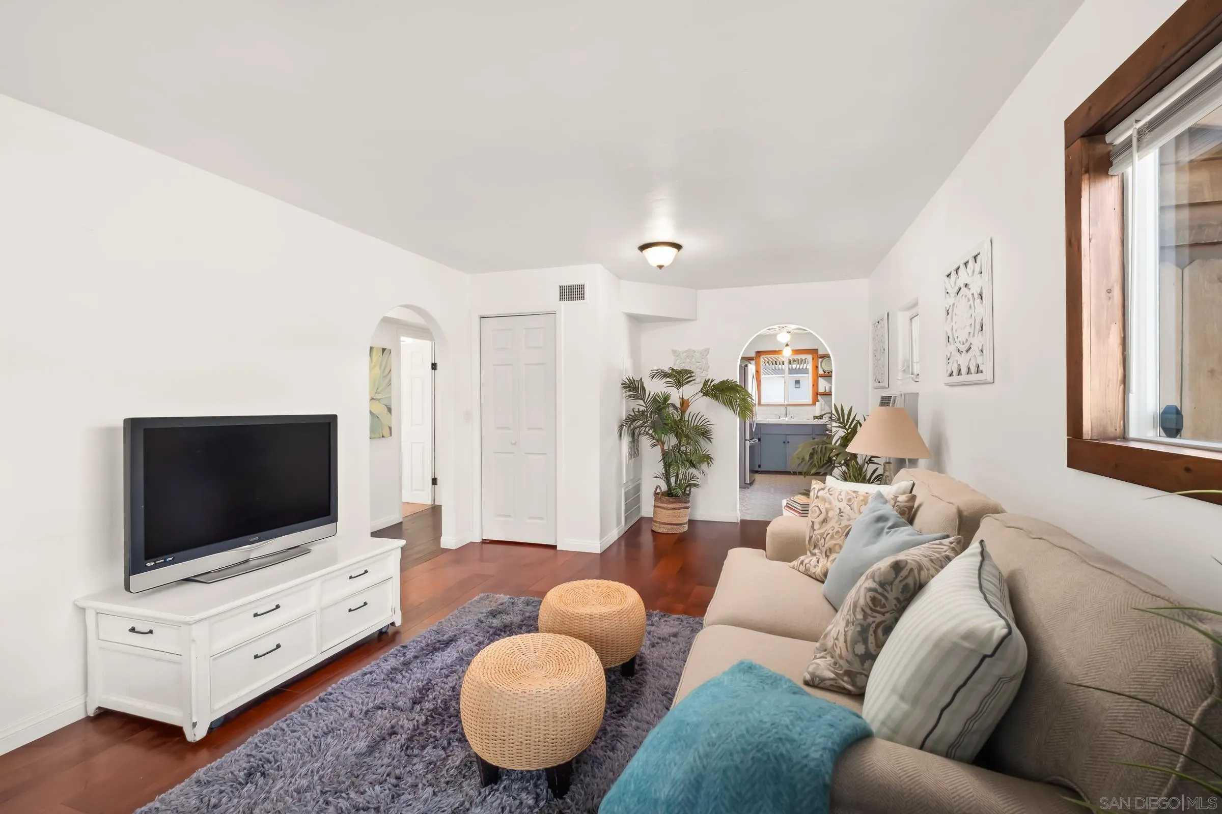 701 Valley Avenue Solana Beach, CA 92075 - Photo 23 of 38 a living room with furniture and a flat screen tv