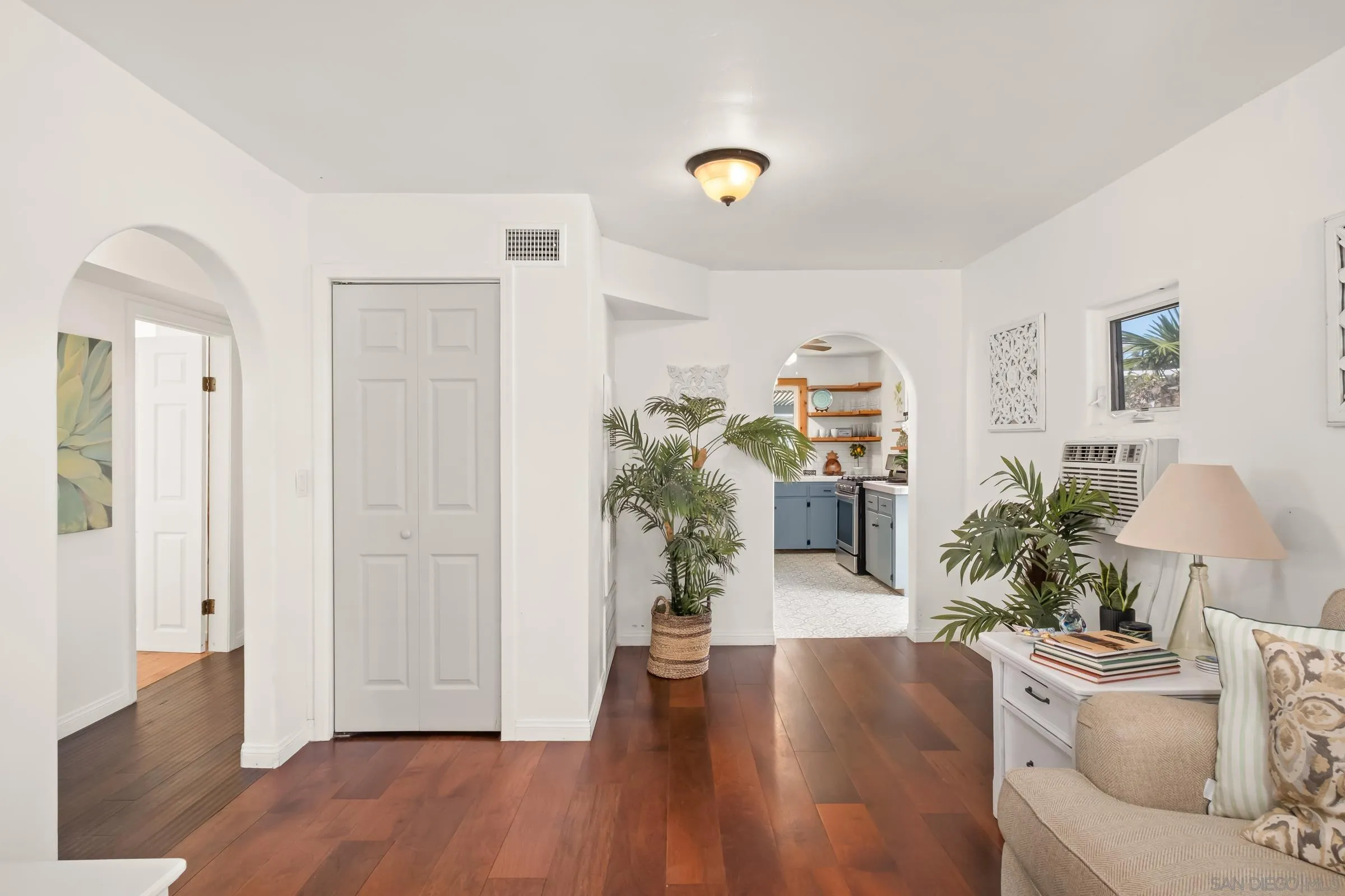 701 Valley Avenue Solana Beach, CA 92075 - Photo 24 of 38 a living room with furniture and a wooden floor