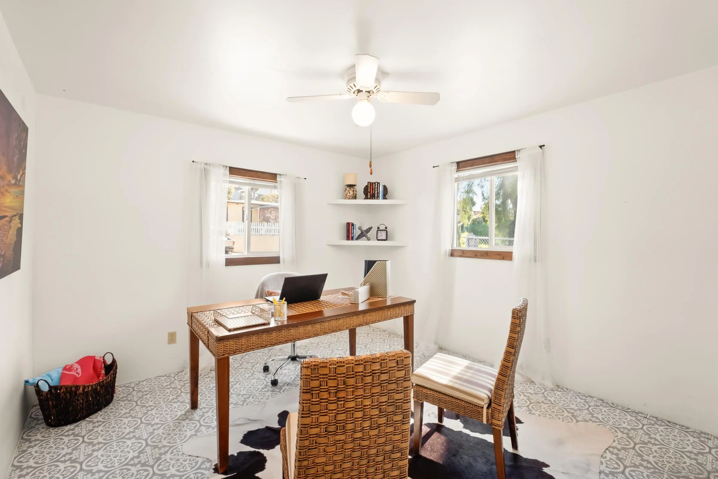 701 Valley Avenue Solana Beach, CA 92075 - Photo 25 of 38 a view of a workspace with furniture and a window