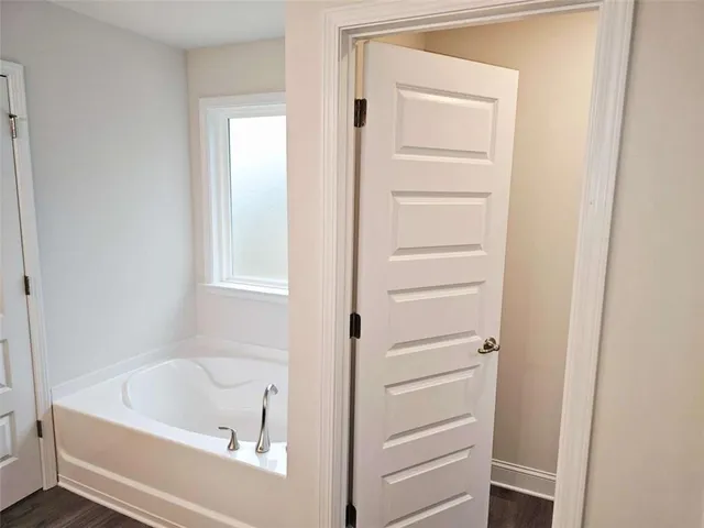 a bathroom with a bathtub