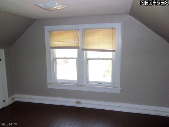 1703-1705 Manchester Road Akron, OH 44314 - Photo 5 of 8 Upstairs Bedroom with wood floor