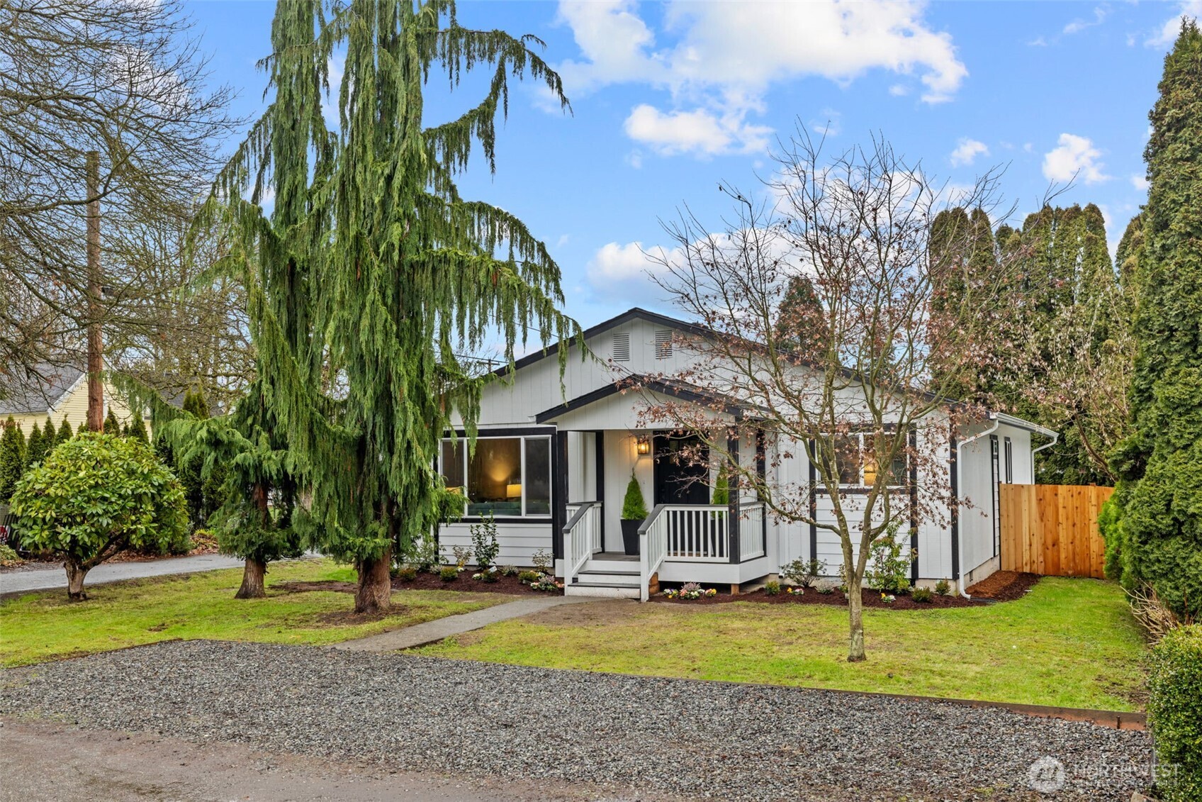 211 Taylor Street Snohomish, WA 98290 - Photo 1 of 24 a view of a house with swimming pool and sitting area