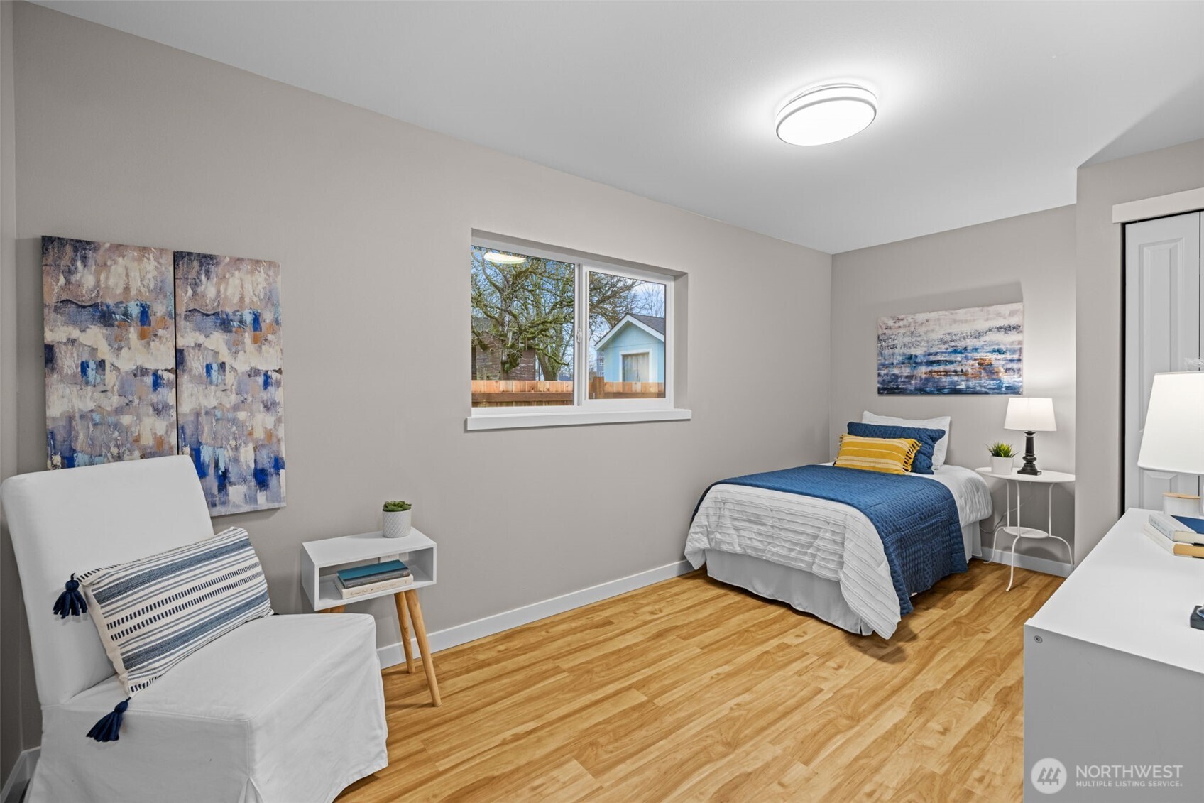 211 Taylor Street Snohomish, WA 98290 - Photo 17 of 24 a bedroom with a bed and a couch