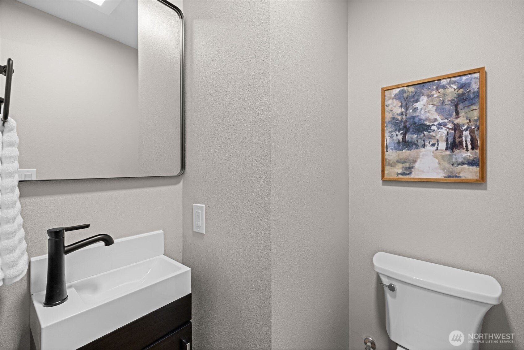 211 Taylor Street Snohomish, WA 98290 - Photo 8 of 24 a bathroom with a toilet a sink and mirror