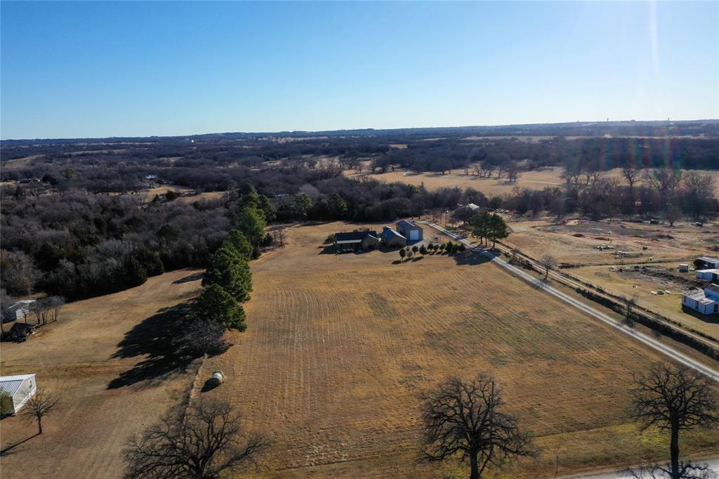1433 County Road 1180 Decatur, TX 76234 - Photo 32 of 36 an aerial view of a house with a yard