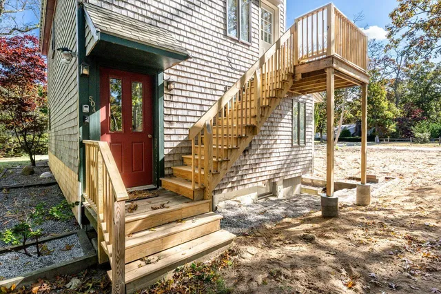 a front view of a house with street