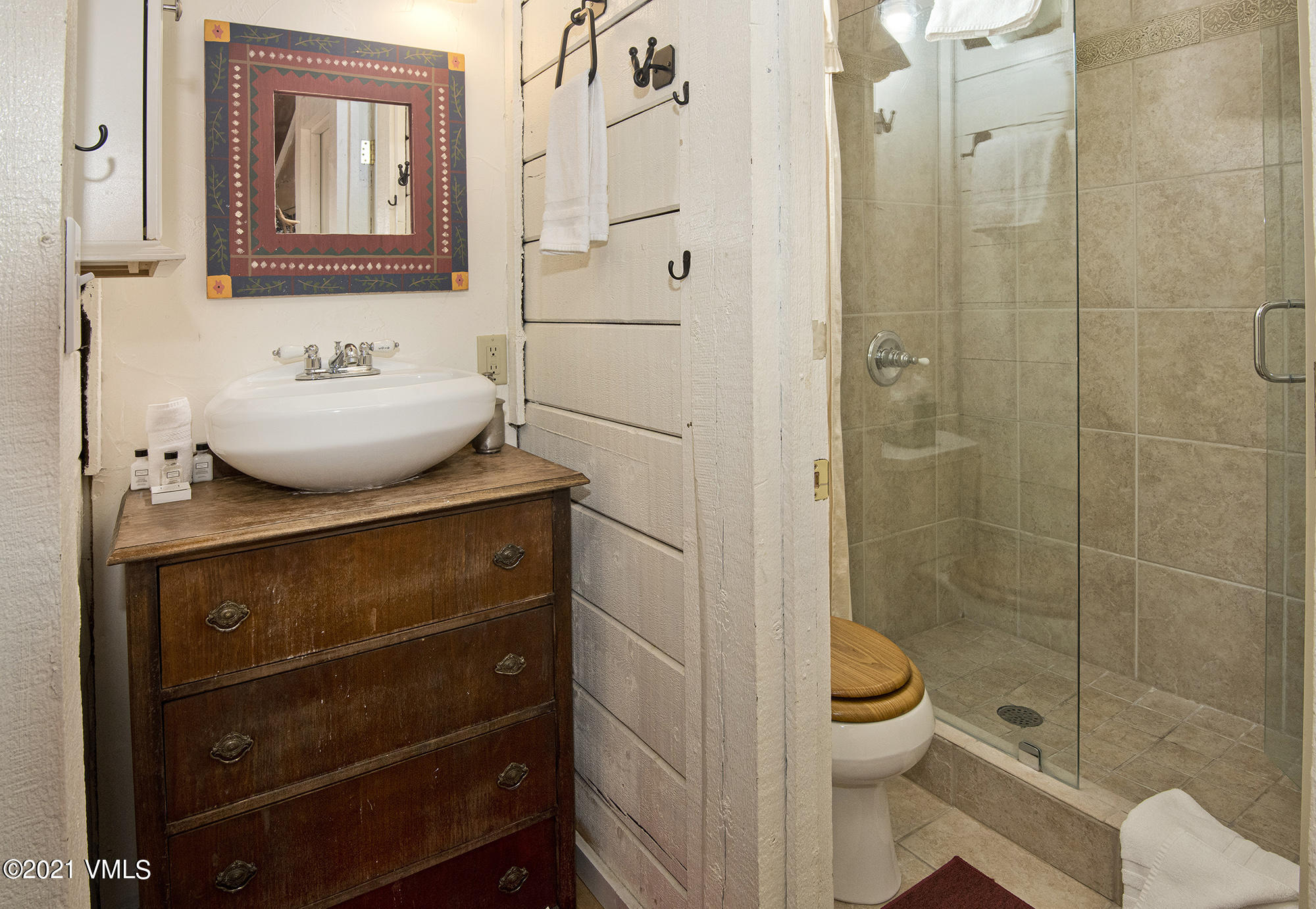 2958 South Frontage Road West, Unit D3 Vail, CO 81657 - Photo 17 of 23 a bathroom with a sink toilet and shower