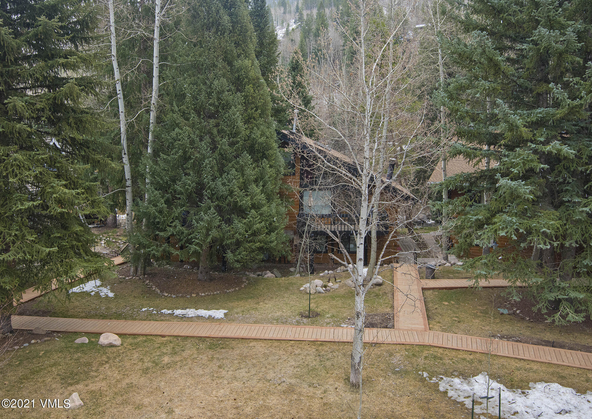 2958 South Frontage Road West, Unit D3 Vail, CO 81657 - Photo 21 of 23 a view of a yard with plants and trees
