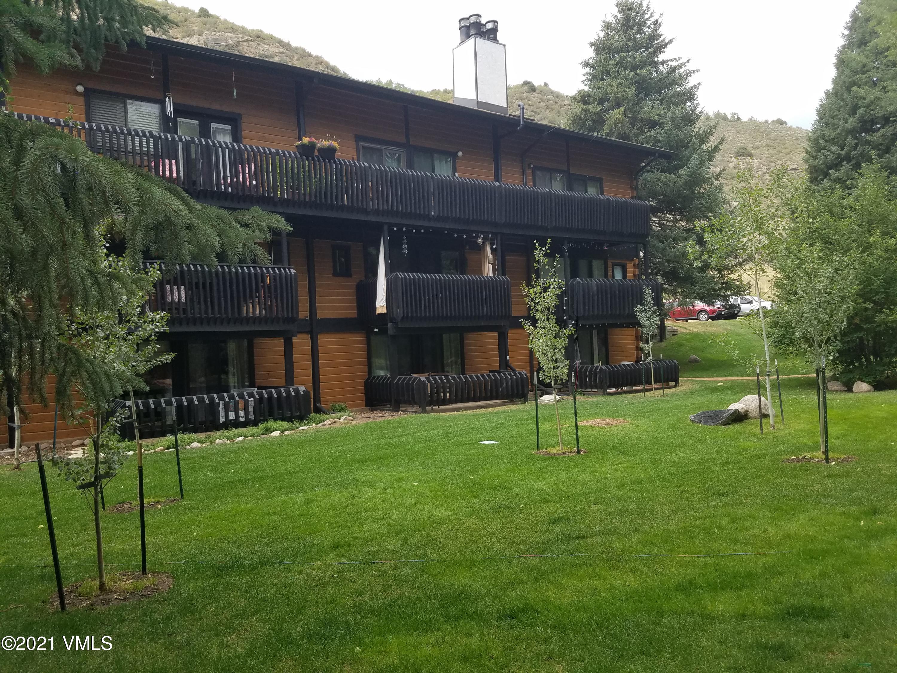 2958 South Frontage Road West, Unit D3 Vail, CO 81657 - Photo 23 of 23 a view of house with a yard