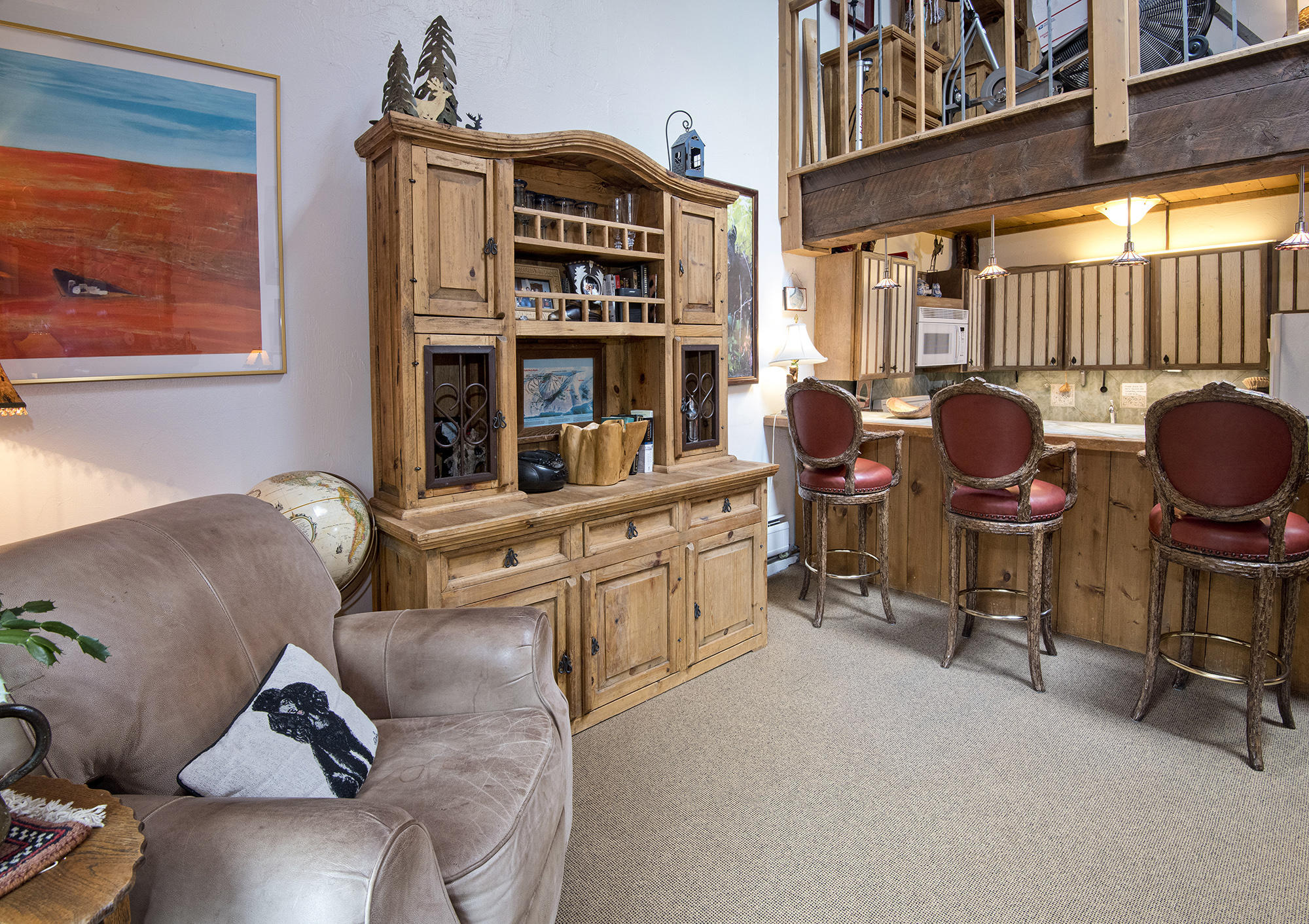 2958 South Frontage Road West, Unit D3 Vail, CO 81657 - Photo 6 of 23 a living room with furniture cabinets and a window